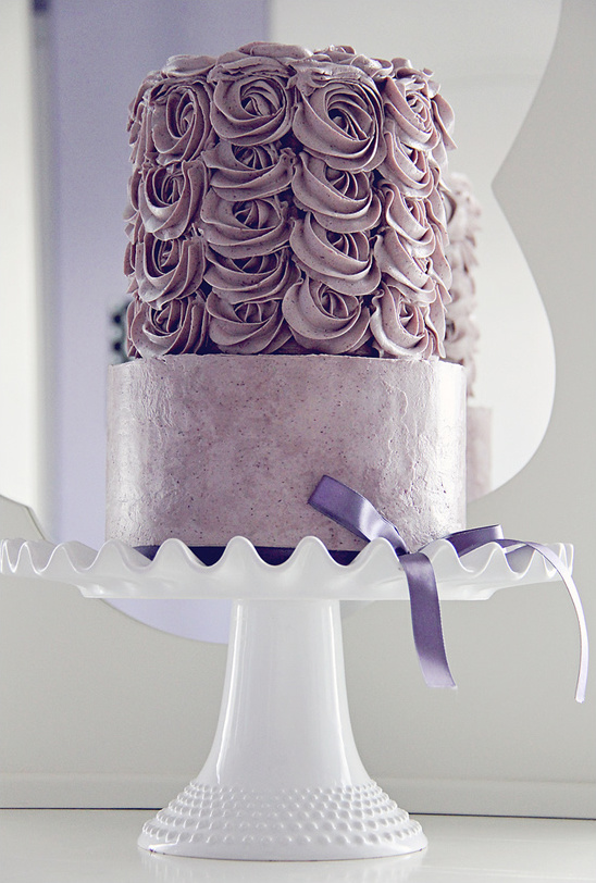 Pretty lavender cake on white stand
