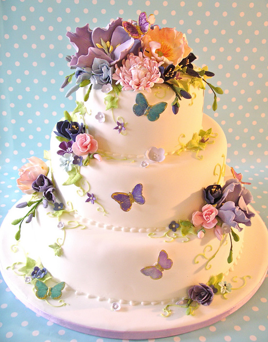 Beautiful floral wedding cake with butterflies