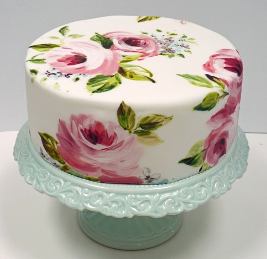 Hand-painted rose cake on a pedestal stand