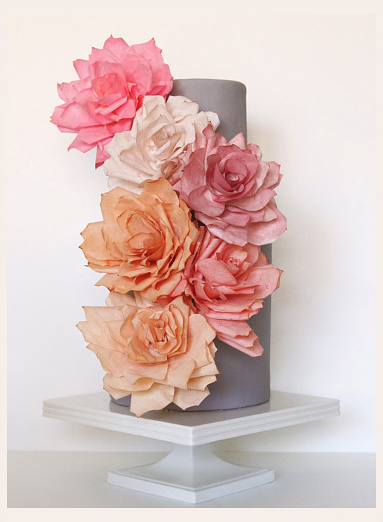 Elegant cake decorated with ombre flowers