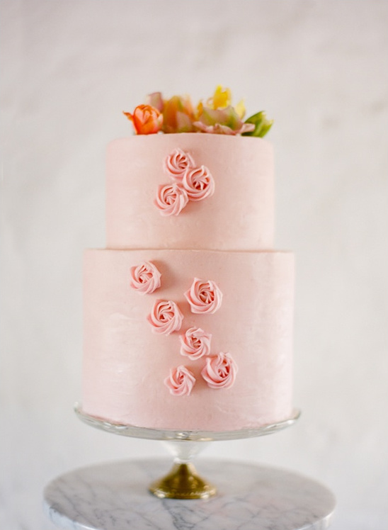 Pretty pink cake with flower decorations
