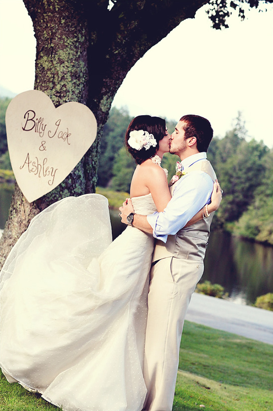 Couple kissing, wedding outdoors