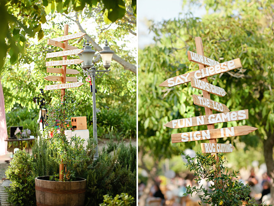Wooden signposts guide guests to wedding events