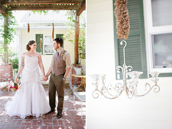 Rustic wedding couple and chandelier detail
