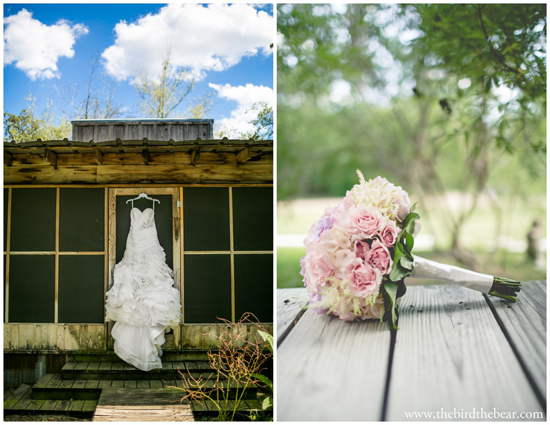 Wedding dress hanging outside with a bouquet on a wooden table