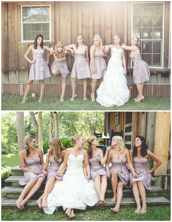 Bride and bridesmaids posing at a wedding, rustic outdoor venue