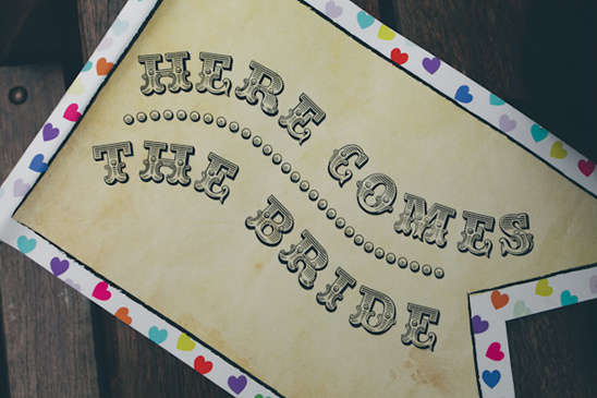 Here Comes the Bride sign with heart border for a wedding