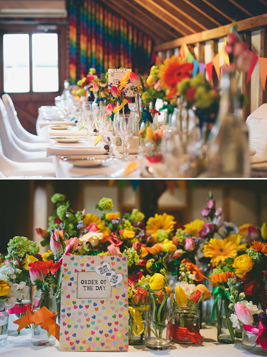 Colorful wedding table with vibrant floral centerpieces and decor
