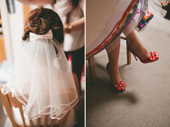 Bride getting ready with a veil and bow, wearing red heels with bows