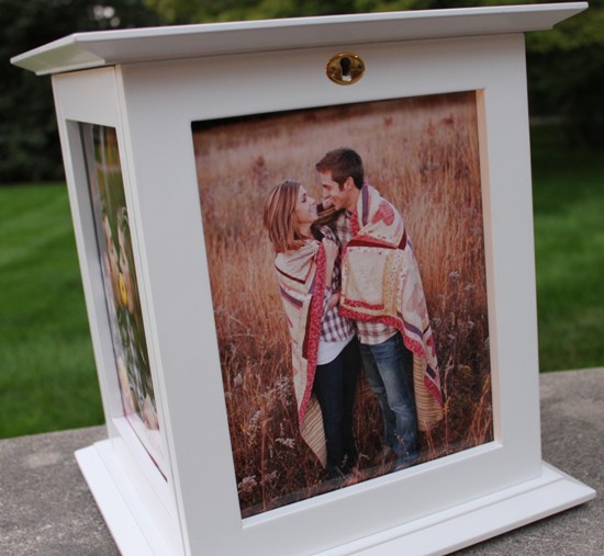White photo frame with a couple, cozy blanket and romantic mood