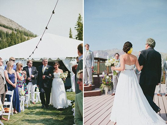 Bride walking down the aisle with father on her wedding day