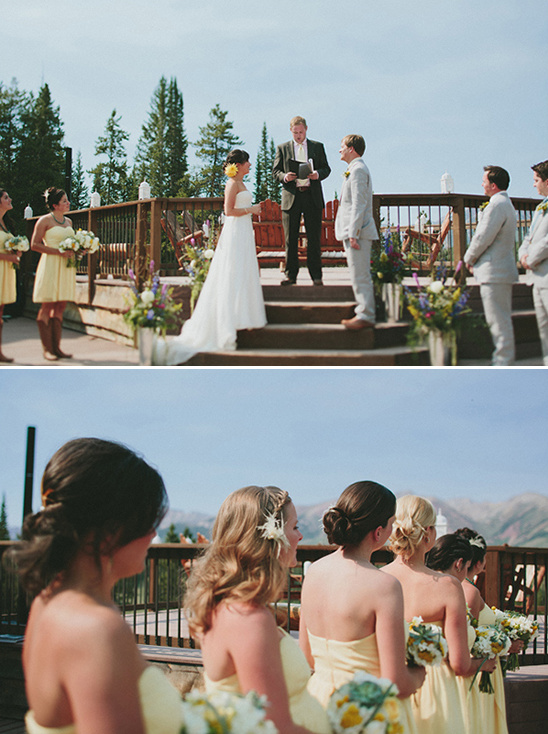 Wedding ceremony with bride, groom, and bridesmaids on outdoor deck
