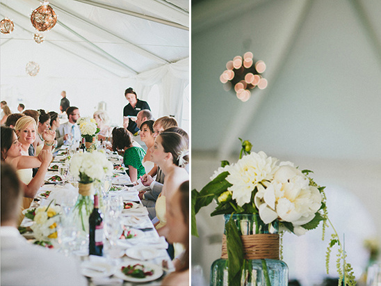 Wedding reception with long table and white flower decorations