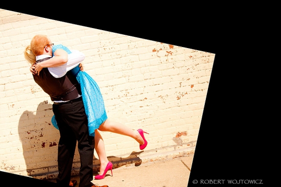Couple in love hugging, with a woman wearing pink high heels