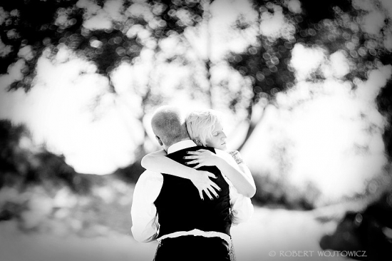 Couple embracing in black and white, romantic moment