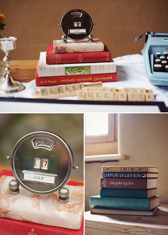 A vintage calendar on books, ideal for wedding guest book decor