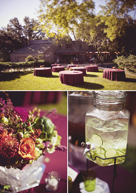 Outdoor reception with tables, flowers, and refreshing drinks