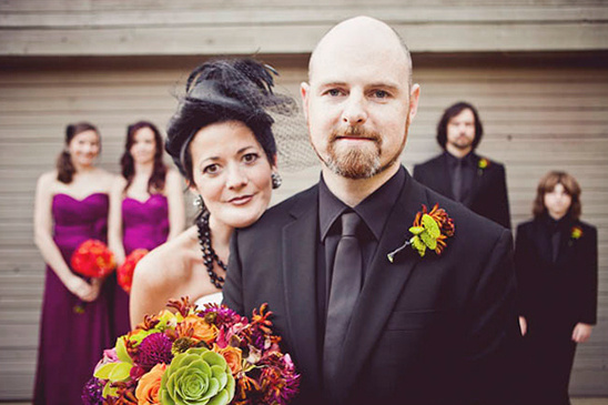 Alternative wedding couple, bridesmaids and groomsmen portrait