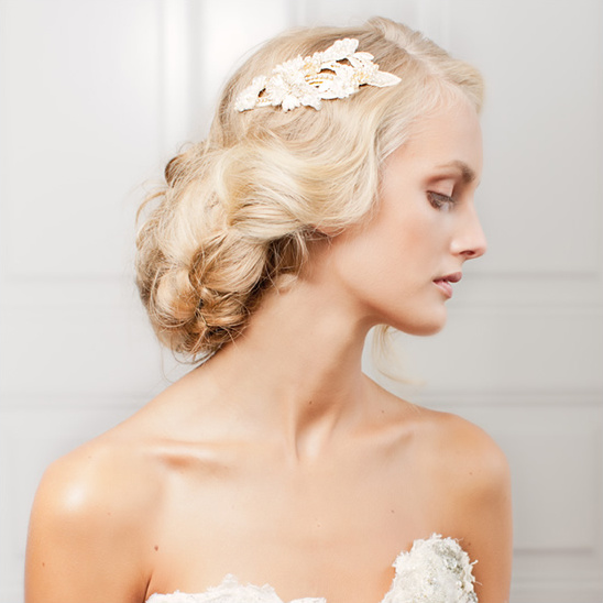 Elegant bride with a beautiful updo and hair accessory