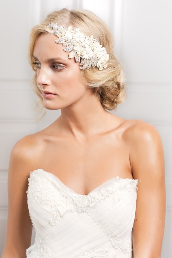 Elegant bride in a wedding dress with a floral headpiece