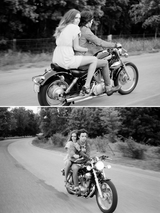 Couple enjoying a motorcycle ride on a scenic road, black and white