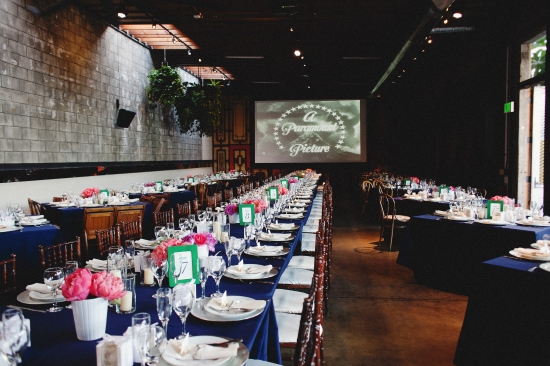 Formal event setting with Paramount Pictures background and table setup