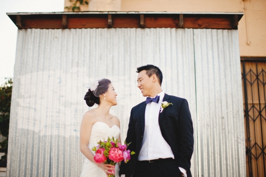 Elegant couple looking at each other on their wedding day