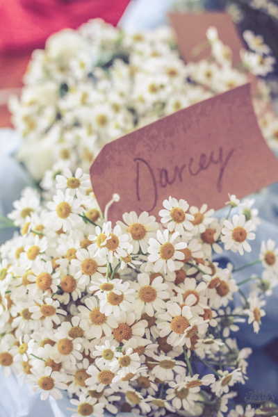 Fresh daisy bouquets with a Darcy tag perfect for gifting
