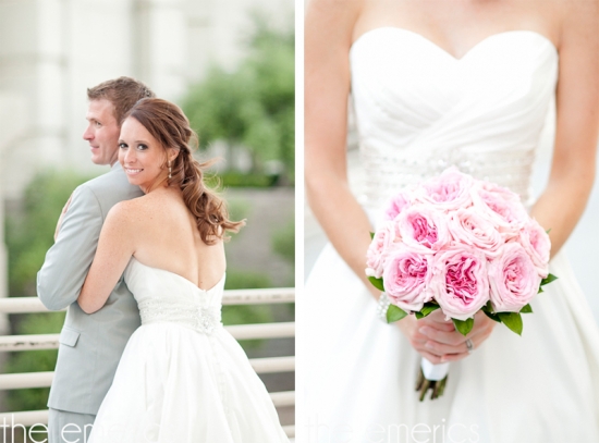 Bride and groom smiling on their wedding day with pink roses bouquet