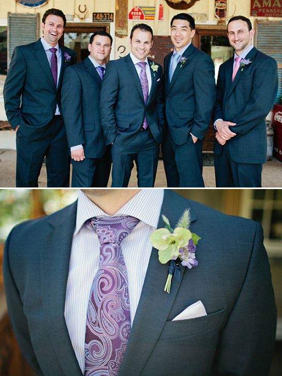 Groomsmen in suits with colorful ties and boutonnieres