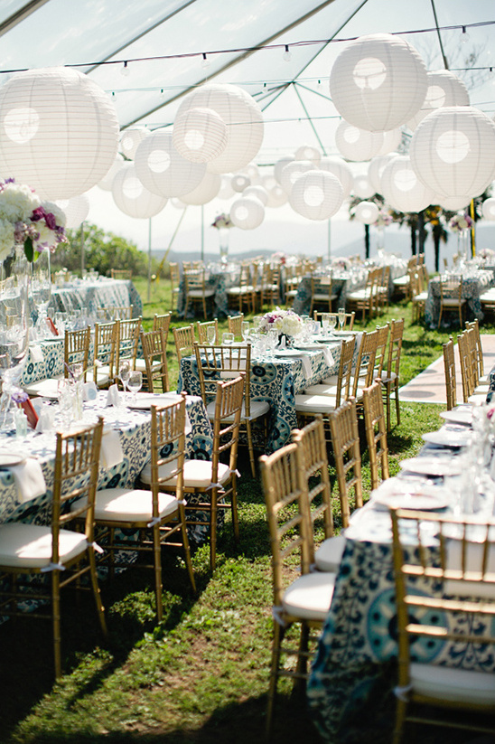 Outdoor wedding reception with paper lanterns decor