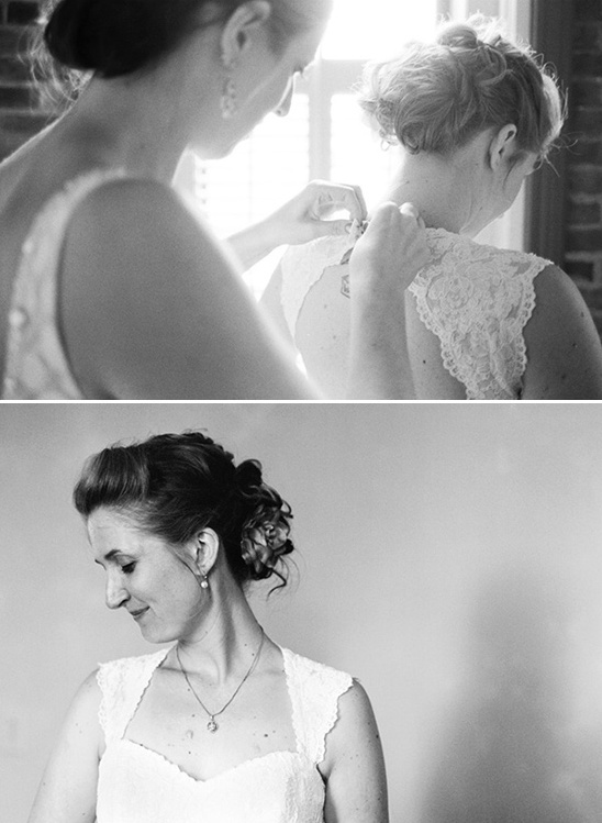 Bride getting ready with help, in elegant wedding dress