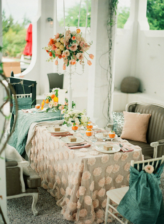 Elegant outdoor wedding table setting with floral decor