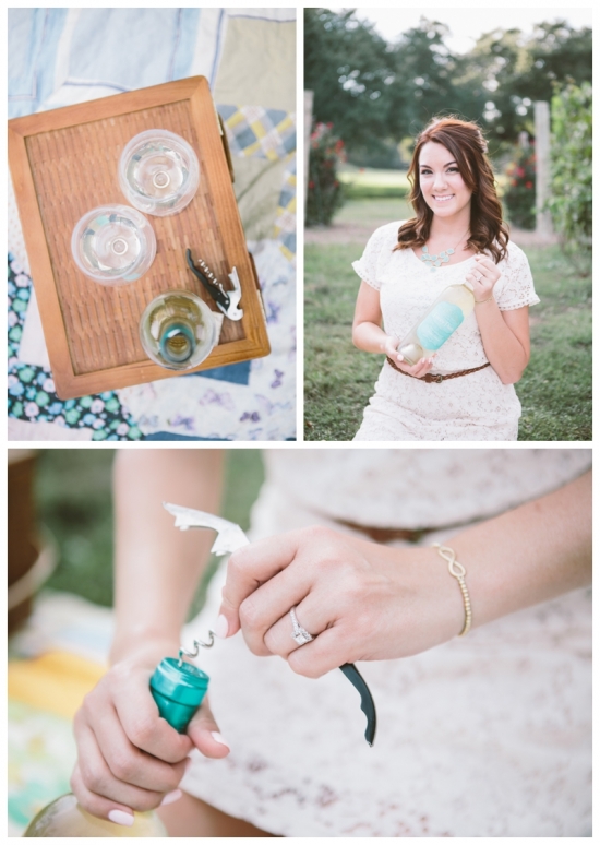 Outdoor picnic with woman opening wine bottle