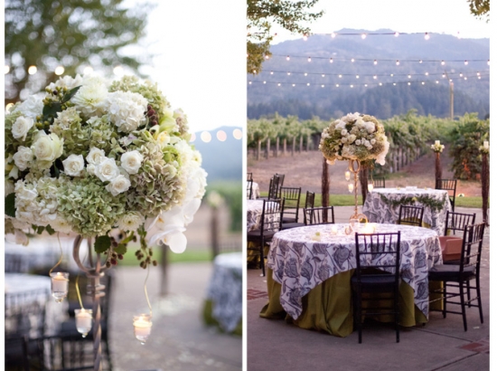 Outdoor wedding reception in vineyard with floral centerpiece