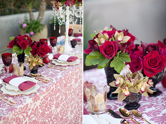 Romantic red roses and orchids on a festive table