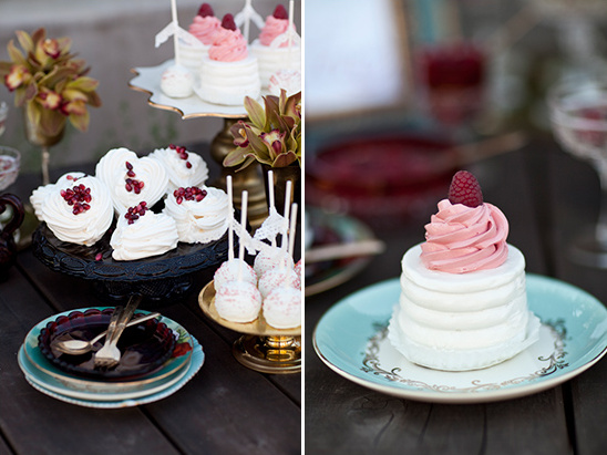 Dessert table with mini cakes and meringues for wedding