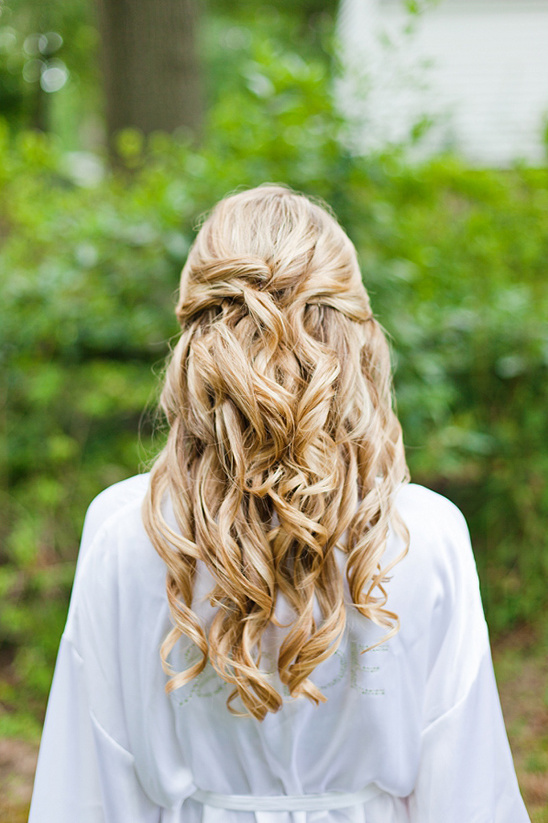 Blonde hair in half up half down wedding hairstyle