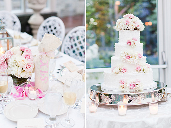 Elegant white wedding cake and table setting with flowers