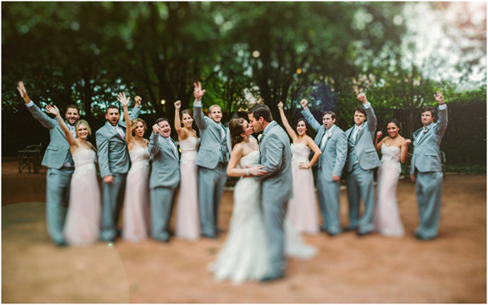 Bridal party cheer for the bride and groom at the Hoffman Haus.