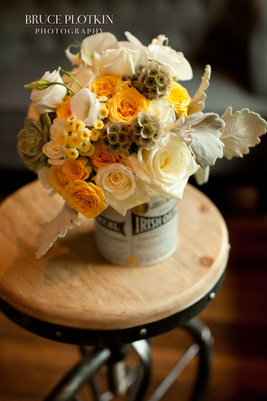 Yellow and white wedding bouquet in tin