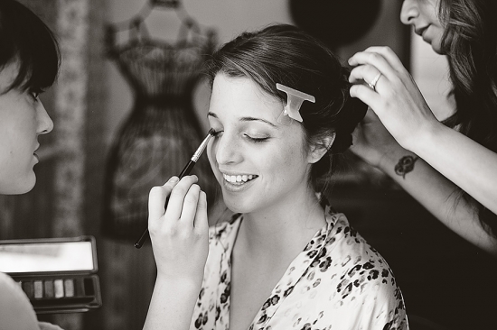 Bride getting makeup and hair done