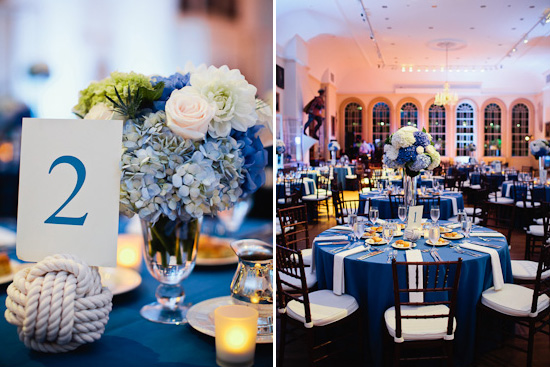 Wedding reception table with blue and white floral centerpiece