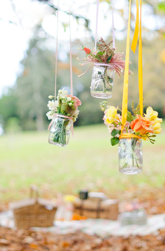 Hanging floral arrangements picnic in the countryside