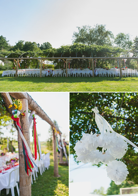 Outdoor wedding reception with rustic pergola decor