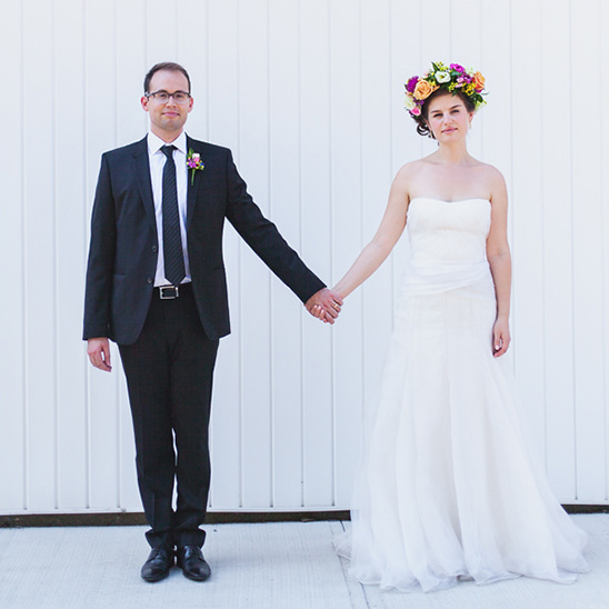 Bride and groom holding hands on their wedding day