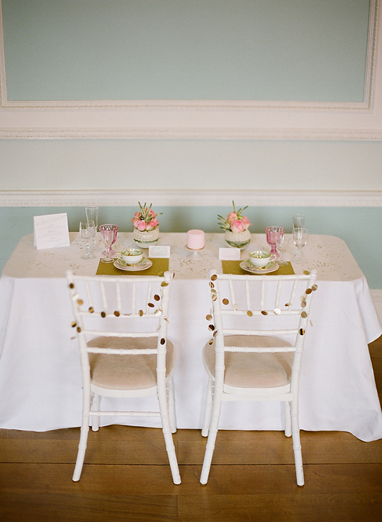 Elegant sweetheart table setting with floral decor