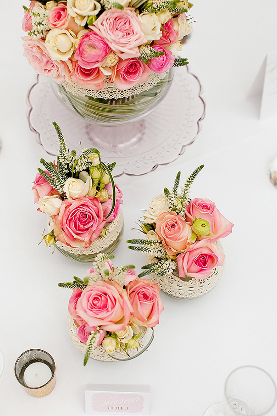 Pink and white rose floral centerpiece displays