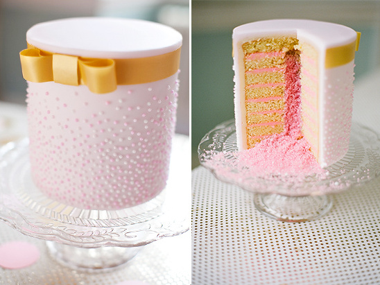 Pink polka dot layer cake with gold ribbon accent