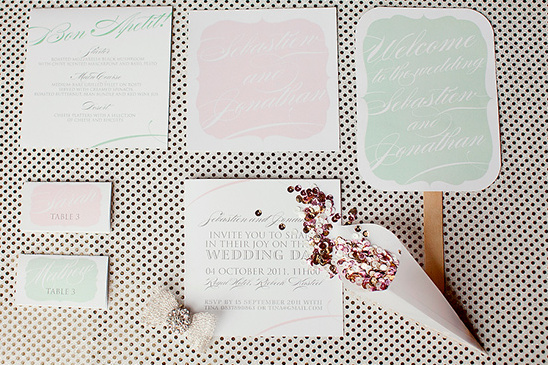 Wedding invitation suite with confetti and decorations